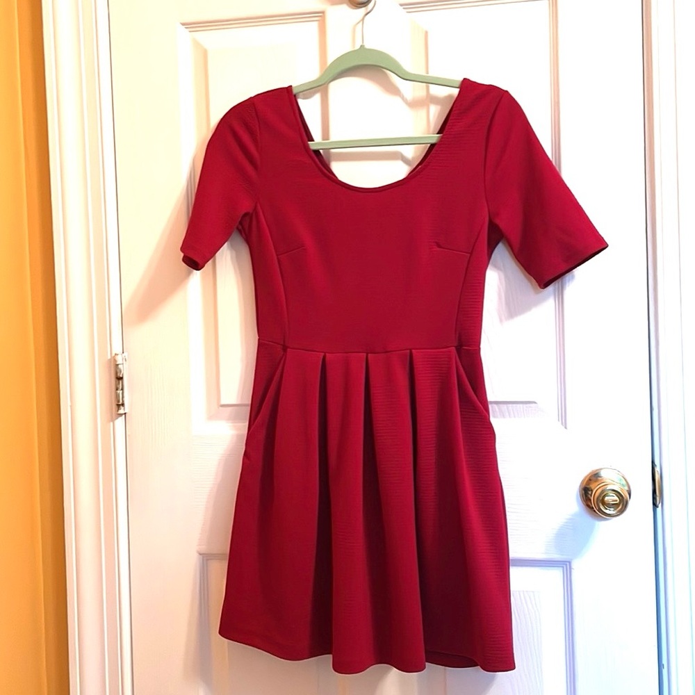 Ruby Pleated mini dress with pockets , size medium